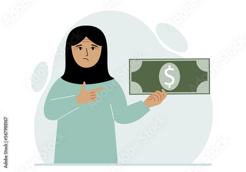 A arab woman holds a large paper bill in his hand. The concept of income, expense, earning or spending money.