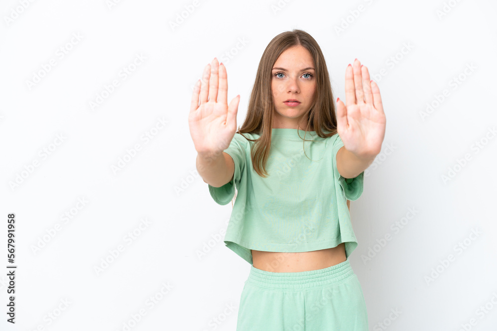 Young Lithuanian woman isolated on white background making stop gesture and disappointed Young Lithuanian woman isolated on white background making stop gesture and disappointed