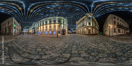spherical seamless night hdr 360 panorama on pedestrian street with stone pavement of old town with festive decoration and illuminations in equirectangular projection