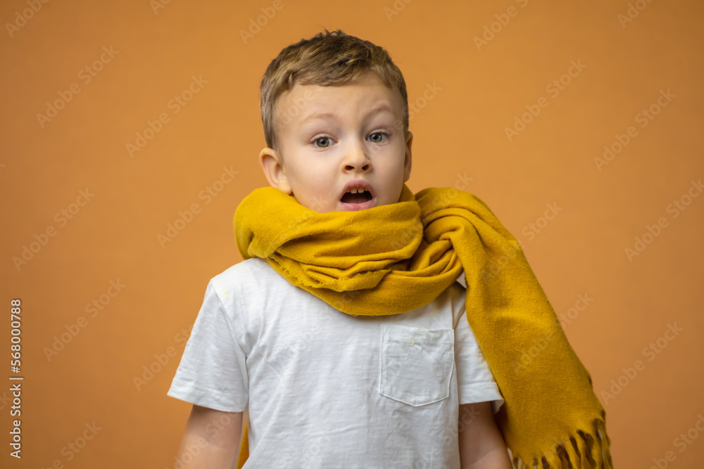 The child has a sore throat, symptoms of throat disease, the boy's