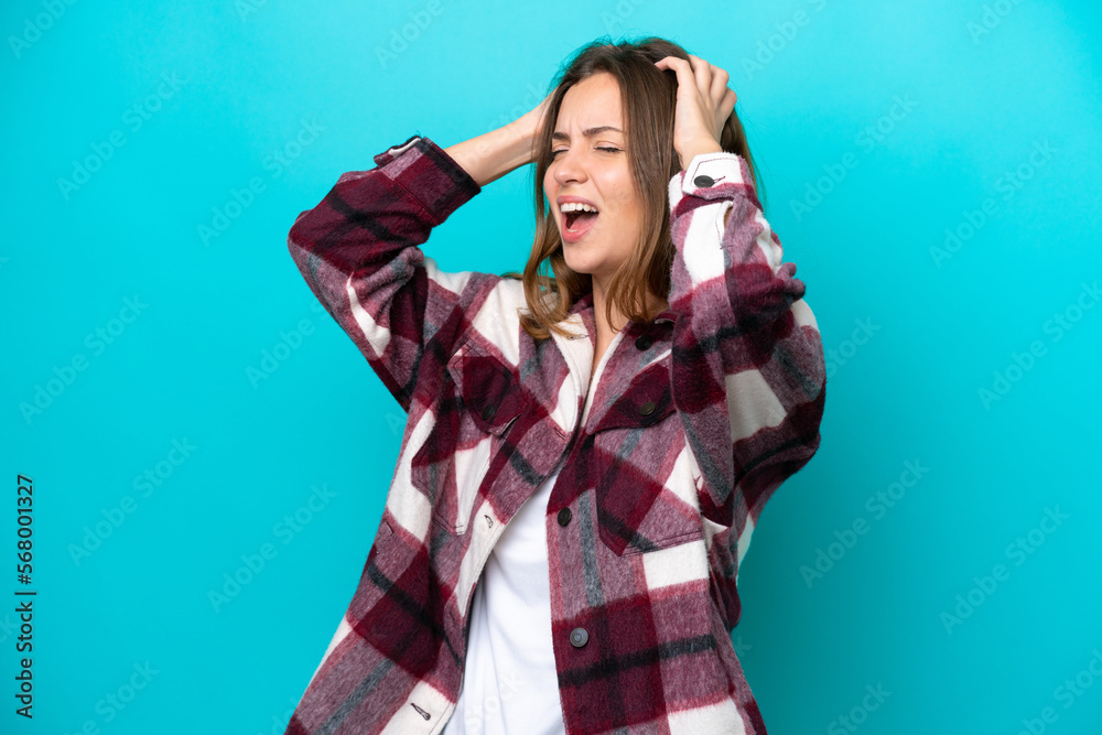 Young caucasian woman isolated on blue background stressed overwhelmed Young caucasian woman isolated on blue background stressed overwhelmed