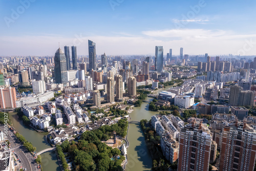 Aerial photo of urban architectural landscape skyline along Wuxi Canal © 昊 周