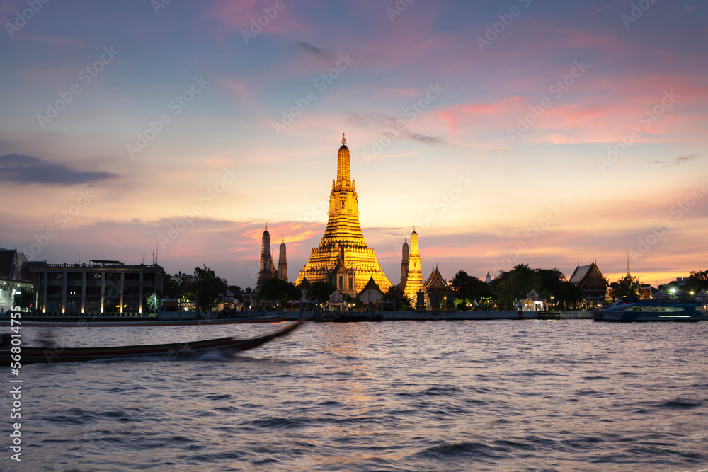 Wat Arun ,lit up after sunset,along the Chao Phraya river,Bangkok,Thailand. Wat Arun ,lit up after sunset,along the Chao Phraya river,Bangkok,Thailand.