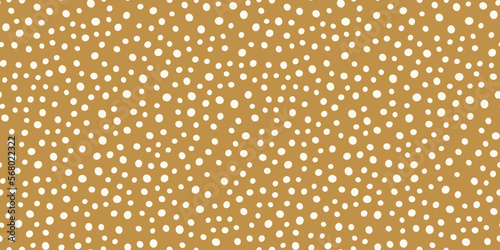 White festive confetti vector polka dot pattern, seamless repeat design. Trendy minimal style on mustard orange background. Great for fabrics, greeting cards, wallpapers, gift wrapping paper