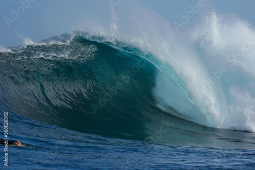 A huge blue ocean wave breaks at the famous South African big wave spot known as Dungeons. 