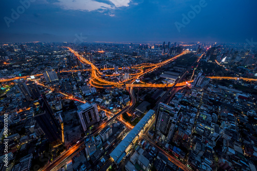 Skyline view of Bangkok business district at sunset.