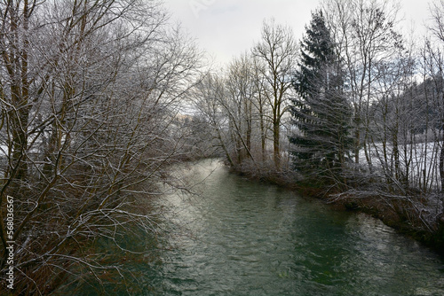 The Poljanska Sora river in December as it flows through the Poljane Sora Valley landscape near Hotavlje in Gorenjska, Slovenia
 photo