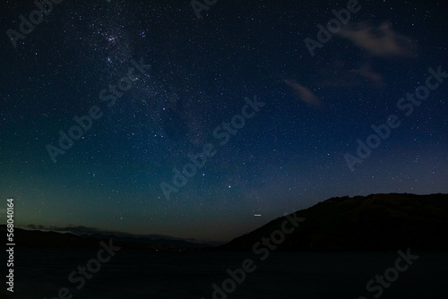 Starry Night Sky over water with Milky Way Galaxy