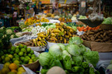 a market full of fruits and vegetables