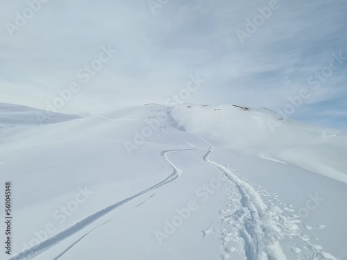 Ski touring in deep snow. Beautiful trail in deep snow. Mountain landscape