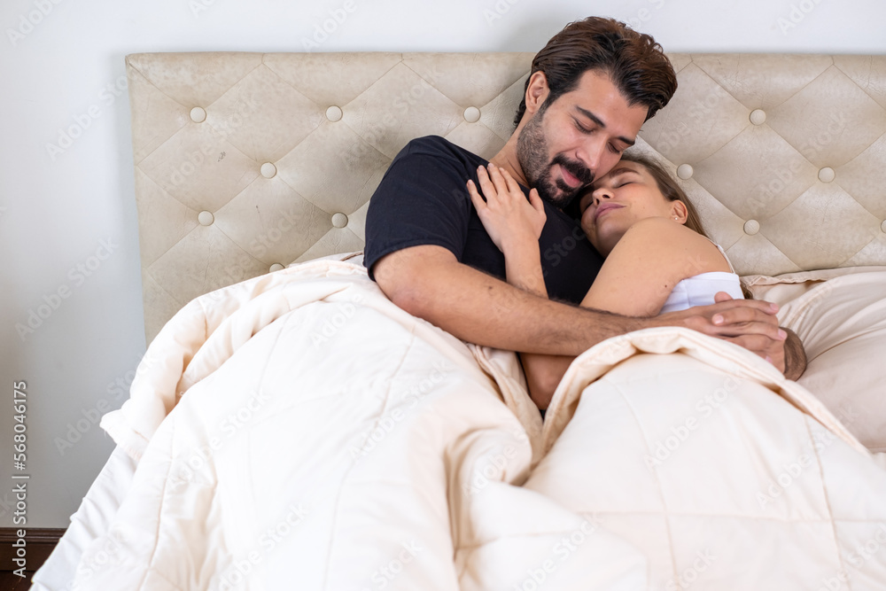 Young couple in a relationship kissing and cuddling. Happy couple hug ...