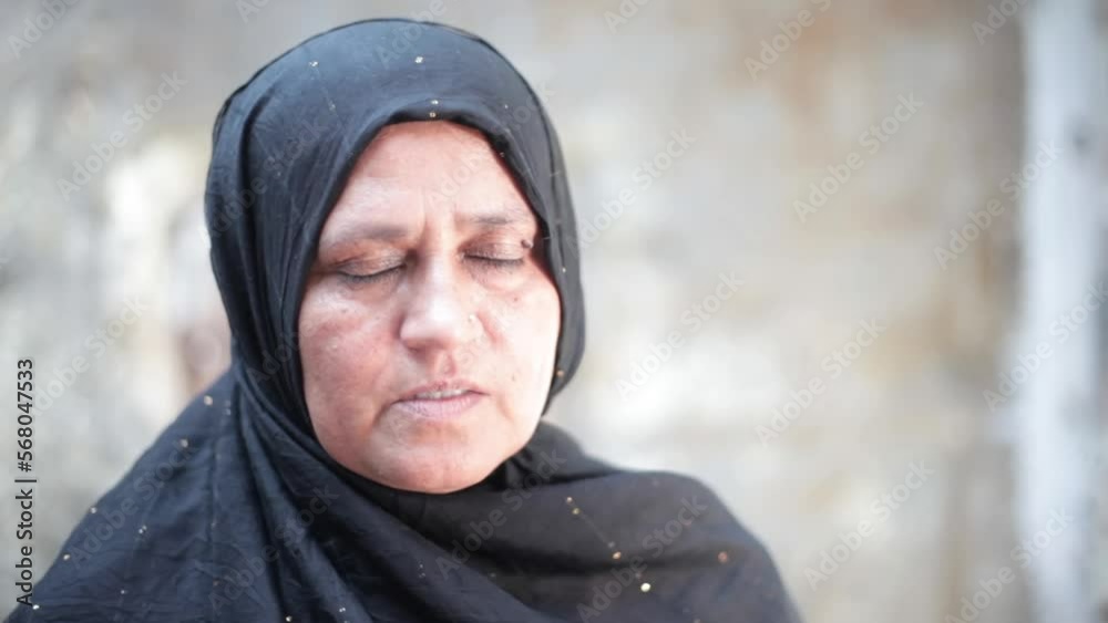 Portrait shot of a Muslim woman making dua, reciting Hd footage. 24FPS. Muslim woman making dua to Allah SWT. Portrait shot of a Muslim woman making dua, reciting Hd footage. 24FPS. Muslim woman making dua to Allah SWT.