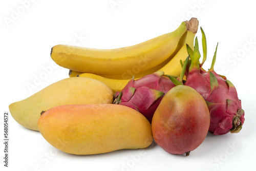 Pitaya, mango fruits, and bananas. Isolated on a white background.