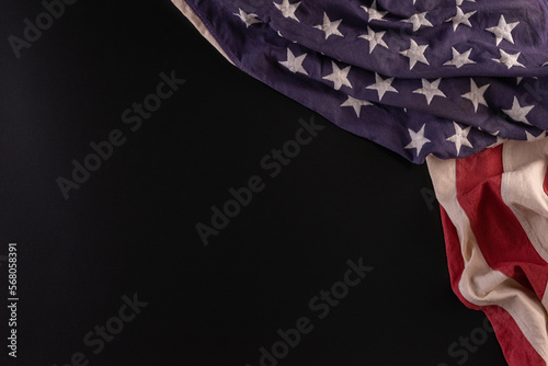 Happy presidents day concept with flag of the United States on black background.