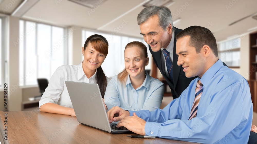 Team of various business people meeting in office. Team of various business people meeting in office.