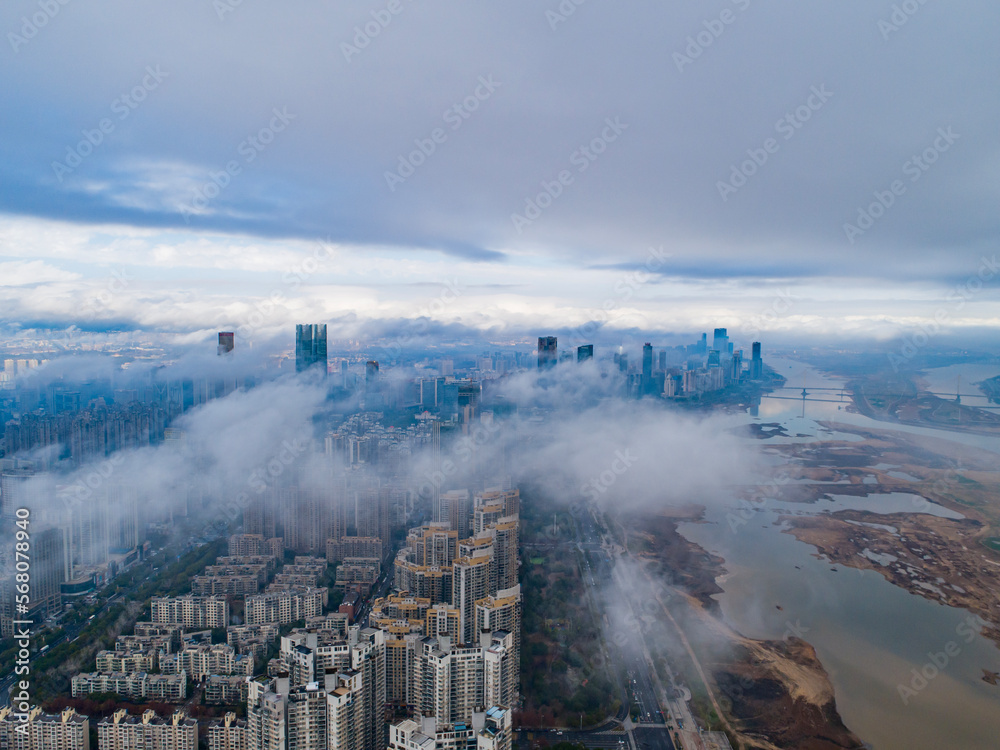 Aerial photography of advective fog over the cityscape of Hong Kong, China
