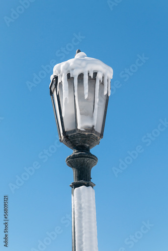 frozen street lamp post