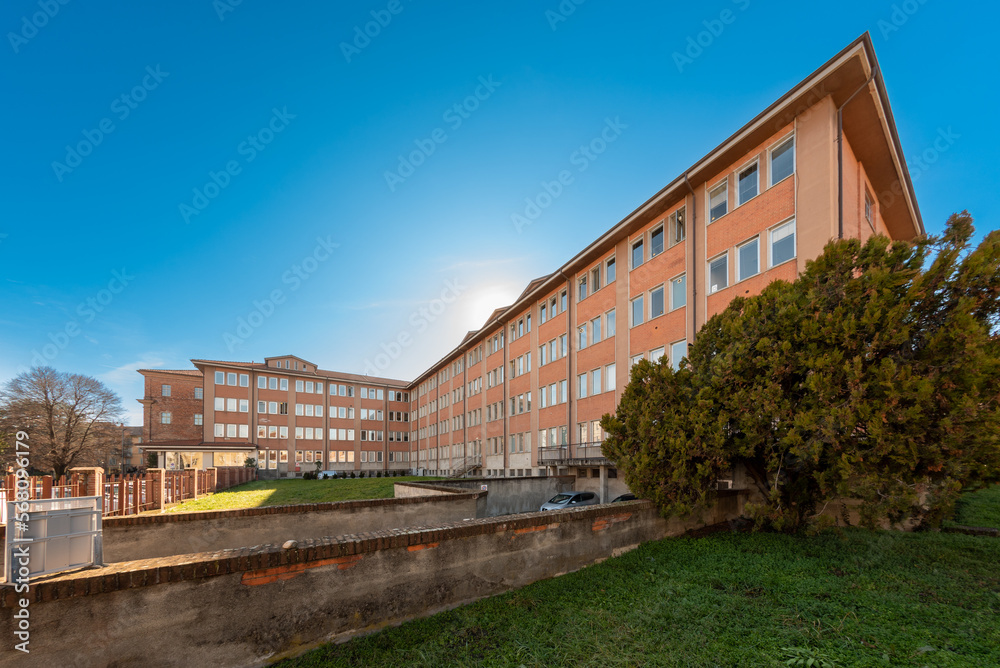 Saluzzo, Piedmont, Italy - February 3, 2023: Saluzzo ASL Cuneo 1 Civil Hospital building in Via Spielberg