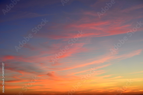 sunset sky with purple, orange, yellow, red and pink clouds isolated
