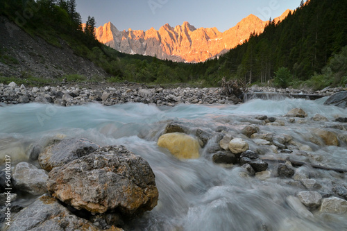 Laliderer Wände in the Karwendel mountains with Johannesbach at sunrise, alpenglow, Hinterriß, Tirol, Austria, Europe photo