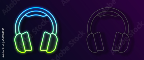 Glowing neon line Headphones icon isolated on black background. Earphones. Concept for listening to music  service  communication and operator. Vector