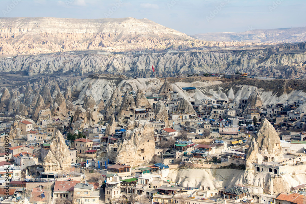 Göreme town as seen from the peak of a mountain.