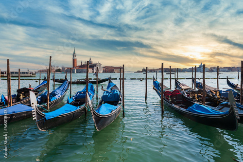 Gondolas and Island of San Giorgio Maggiore in the background in the lagoon of Venice in Veneto, Italy