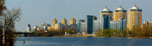 Panorama Ukraine embankment Kiev with multi-story buildings