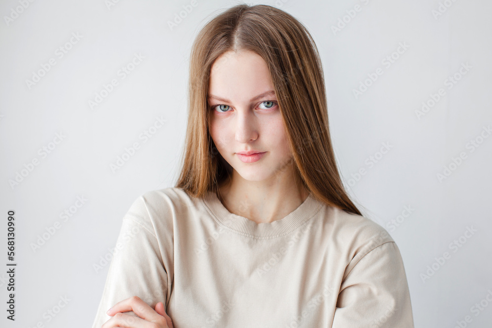 Portrait of young beautiful cute cheerful girl smiling over white background Portrait of young beautiful cute cheerful girl smiling over white background