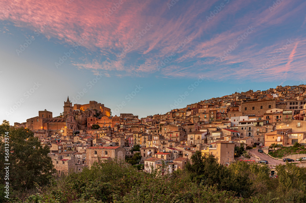 Skyline of the medieval village of Caccamo at dusk, province of Palermo IT