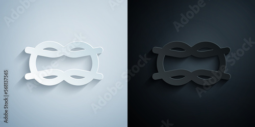 Paper cut Nautical rope knots icon isolated on grey and black background. Rope tied in a knot. Paper art style. Vector