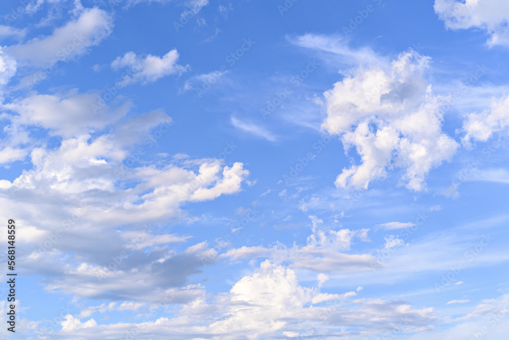 White clouds in a bright blue sky. The beauty of the nature White clouds in a bright blue sky. The beauty of the nature