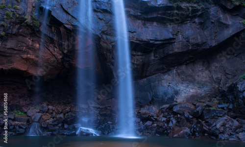 Long exposure waterfall with the cave 