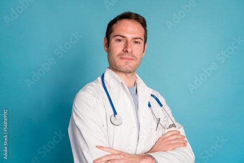 Smiling doctor with crossed arms