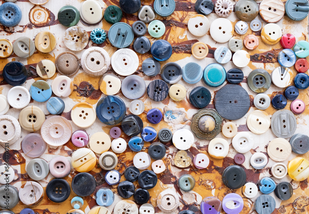 Group of retro colorful clothing fashion buttons on a board Group of retro colorful clothing fashion buttons on a board