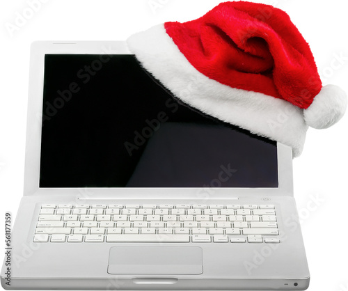 Laptop with santa hat isolated on white background