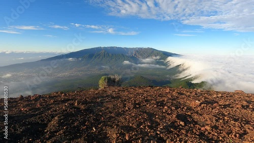 Timelapse o video rapido de la caida de las nubes a traves de las montañas en la isla de la Palma, con la caldera de taburiente al fondo. photo