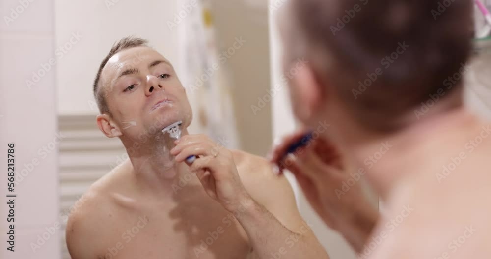 Man cut himself with a sharp razor blade Man cut himself with a sharp razor blade