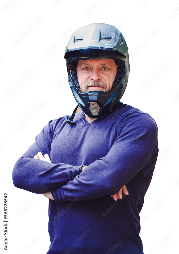 a senior man in dark helmet outdoor. Casual clothes. Crossed hands. Blue sweater. Outdoor blurred background. Closeup.