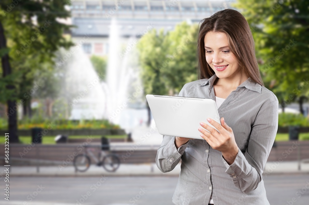 Young professional business woman with digital tablet Young professional business woman with digital tablet