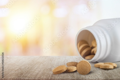 Set of pill or drug medication on the desk photo