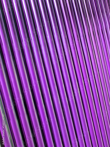 purple solar power panel, violet glass tube heap, long pipe closeup, renewable energy, modern technology diversity