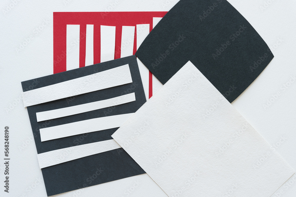 short white paper stripes on black and red paper cards and plain white and black note papers short white paper stripes on black and red paper cards and plain white and black note papers