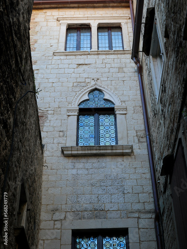 windows of the building at a narrow street in Split Croatia