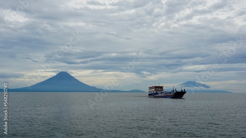 Ferry leaving the volcanic island of Ometepe on Lake Nicaragua. photo