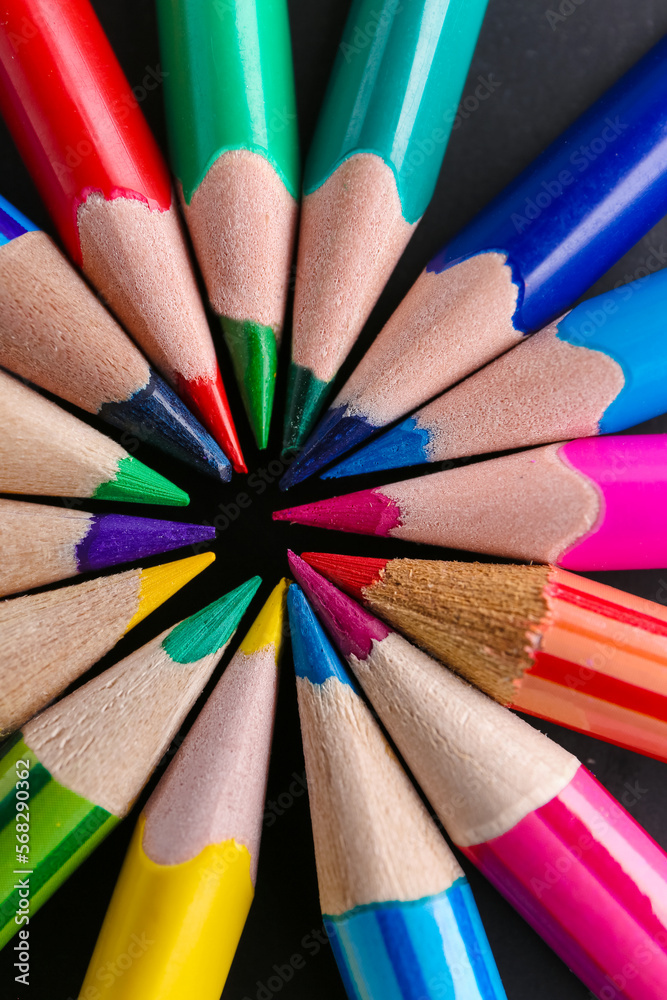 Set of colorful pencils on black background, closeup Set of colorful pencils on black background, closeup