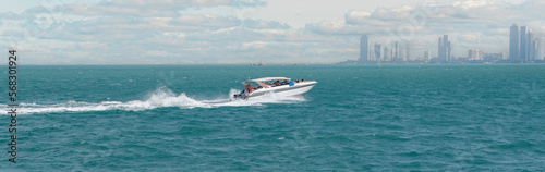 Sea trips on speedboat. Tourist boats in sea, Koh Lan Pattaya Thailand. Speedboats are available for tourists to rent for snorkeling and diving trips. © Celt Studio