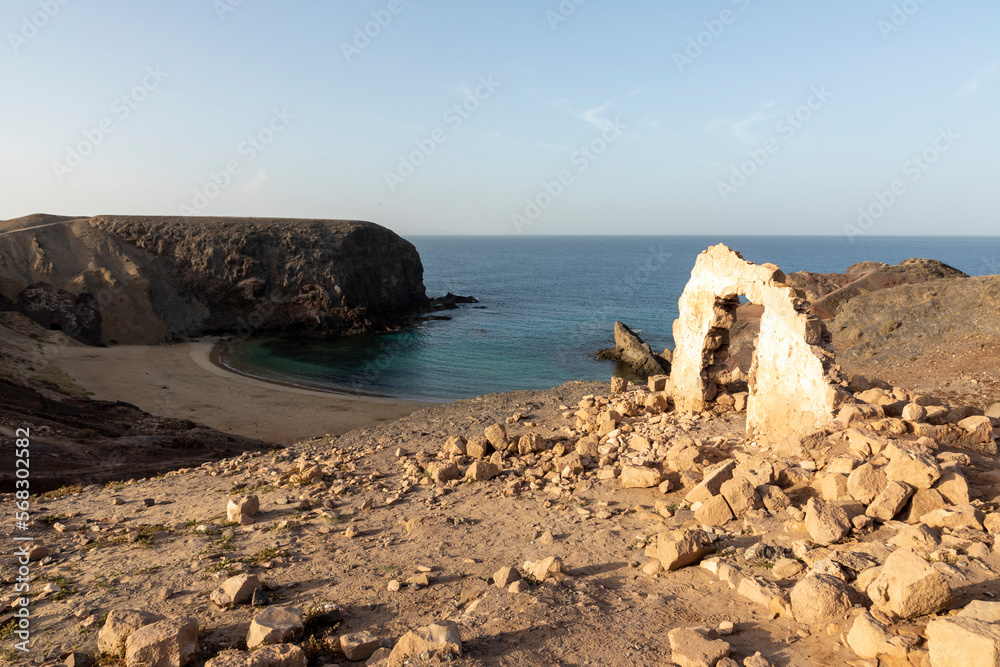 Papagayo beach in Playa Blanca, Lanzarote with old ruin of fishermens hut