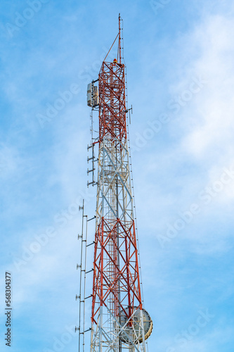 telecommunication tower. Telecommunication towers with wireless antennas on blue sky