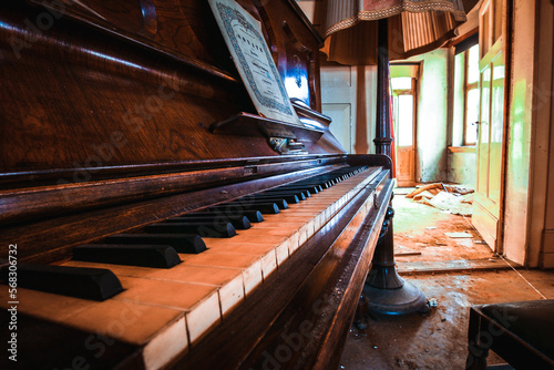 old piano in an abandoned lost place